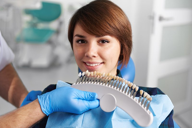 woman having her teeth whitened at the dentist